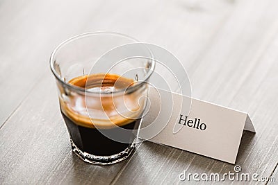Fresh brewed Espresso coffee in shot glass Stock Photo