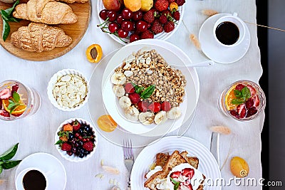 Fresh and bright continental breakfast table, abundance healthy meal variety Stock Photo