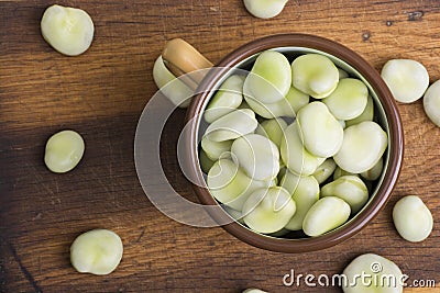 Fresh broad beans on wooden board Stock Photo