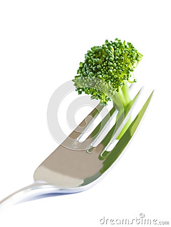 Fresh broccoli on fork isolated on white Stock Photo