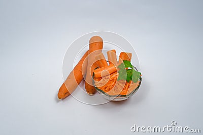 Fresh carrots and slices on white background Stock Photo