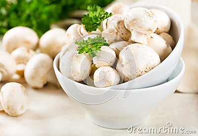 Fresh champignon mushrooms Stock Photo