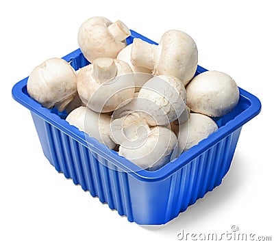 Fresh champignons in plastic packaging isolated on white background Stock Photo