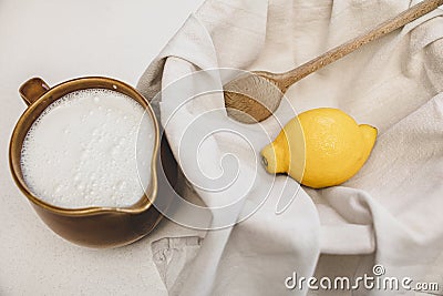 Fresh cheese making recipe ingredients, milk, lemon and a cotton cloth Stock Photo