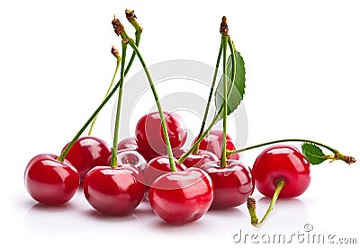 Fresh cherries with green leaves Stock Photo