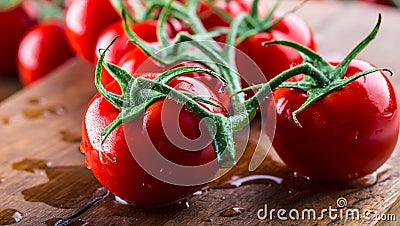 Fresh cherry tomatoes washed clean water. Cut fresh tomatoes Stock Photo