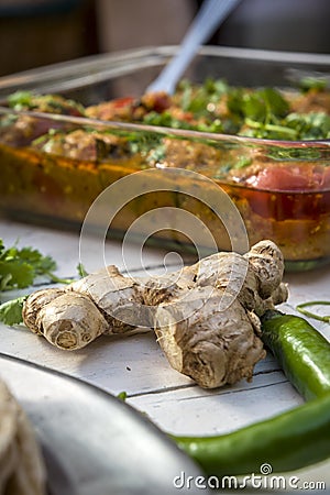 Fresh chili and ginger on white table Stock Photo