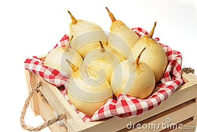 Fresh chinese pears on wooden crate Stock Photo