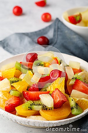 Fresh chopped fruit salad in a bowl Stock Photo