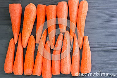 Fresh cleared yellow orange carrot vegetables prepared for cooking healthy organic vegan food Stock Photo