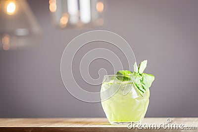 Fresh Cocktail with Lime and Basil Leaves, Horizontal View, Free Space for Text Stock Photo