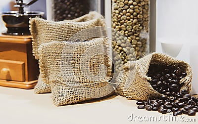 Fresh coffee beans in hemp sack, Roasted coffee beans Stock Photo