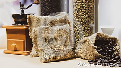 Fresh coffee beans in hemp sack, Roasted coffee beans Stock Photo