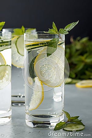 Fresh cold detox non-alcoholic cocktails for healthy eating on gray table. Stock Photo