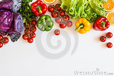 Fresh colorful organic vegetables on a white background, farming and healthy food concept. Copy space. Flat lay Stock Photo