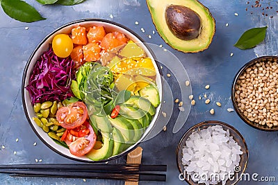 A fresh, colorful poke bowl with a variety of fruits and vegetables, ready to be enjoyed Stock Photo