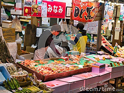 Fresh crab for sale at a stall at the Omicho Market in Kanazawa, Japan Editorial Stock Photo