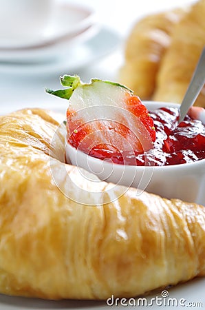 Fresh Croissant and strawberry jam Stock Photo