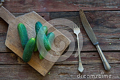 Fresh cucumber on the wood plate Stock Photo