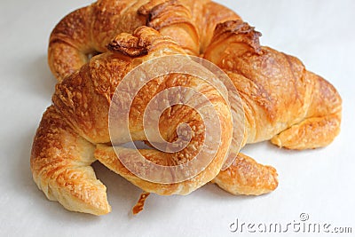 Fresh delicious butter croissant white background. Stock Photo