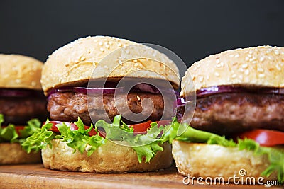 Fresh and delicious home made burgers. Stock Photo