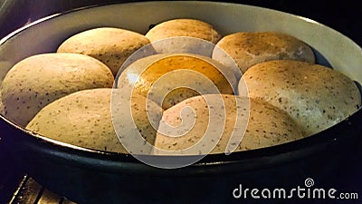 Homemade Mini Bread in the Oven Stock Photo
