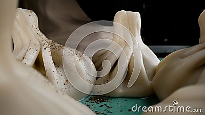 Fresh delicious traditional georgian khinkali with cheese or meet. Boiled khinkali close-up. Stock Photo