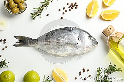 Fresh Dorado fish, spices and cooking ingredients on background, top view Stock Photo