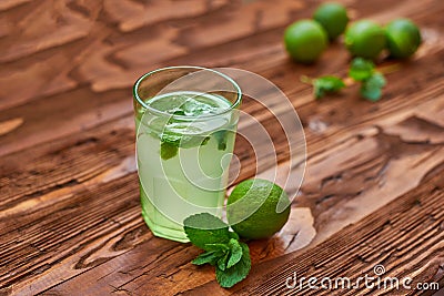 Fresh drink photo of home made limonade on wooden background Stock Photo