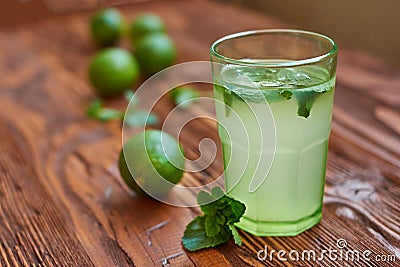 Fresh drink photo of home made limonade on wooden background Stock Photo