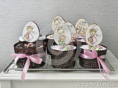 Fresh Easter cakes are displayed on the festive table Editorial Stock Photo