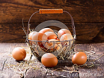 Fresh eggs in a basket Stock Photo