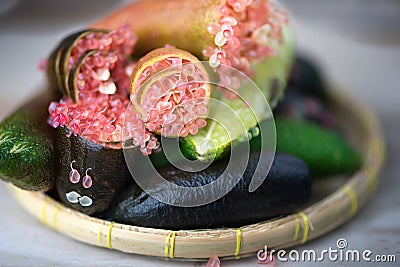 Fresh finger lime on bamboo plate Stock Photo