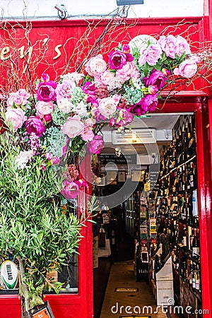 Fresh flower arch on Gibneys Wine shop Malahide County Dublin Editorial Stock Photo