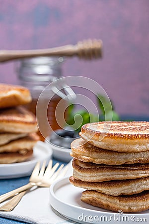 Fresh Fluffy Pancakes Stack on Plate. Copy Space Stock Photo