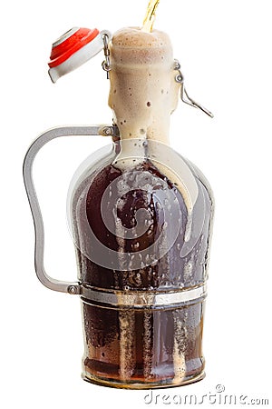 Fresh foam spilling down an over filled growler Stock Photo