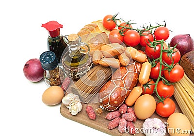 Fresh food, spices, olive oil and sauce on a cutting board on a Stock Photo