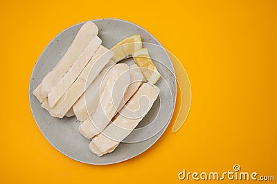 Fresh frozen squid on plate Stock Photo