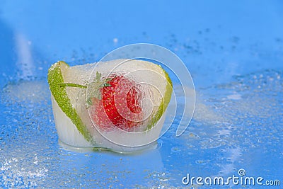 Fresh fruit iced in a piece of ice Stock Photo