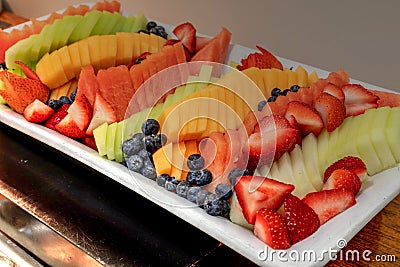 Fresh fruit platter including watermelon, cantaloupe, honeydew m Stock Photo