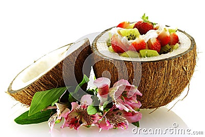 Fresh fruit salad served in half coconut Stock Photo