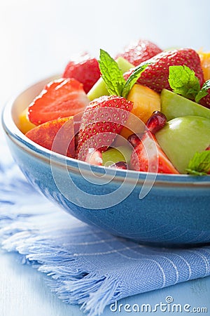 Fresh fruit salad with strawberry, apple, nectarine, pomegranate Stock Photo
