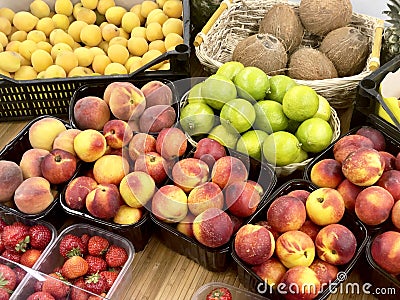 Peaches, strawberries, coconuts, apricots and lime close-up Stock Photo