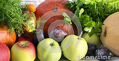 fresh fruits and vegetables, pumpkins, apples, greens, plums, au Stock Photo