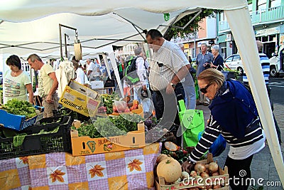 Fresh fruits and vegetables at the market Editorial Stock Photo