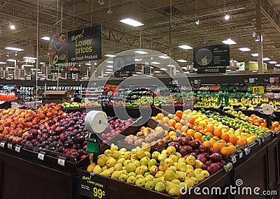 Fresh fruits and vegetables sale at grocery store Editorial Stock Photo
