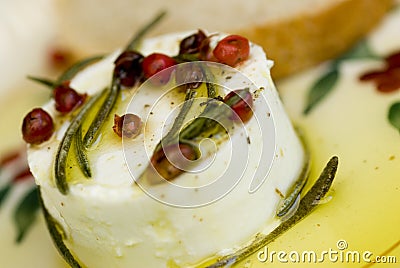 Fresh goat cheese with extra virgin olive oil Stock Photo