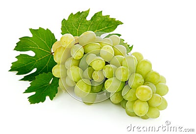 Fresh grape fruits with green leaves Stock Photo