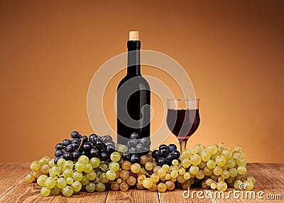 Fresh grapes, bottle and glass of wine Stock Photo