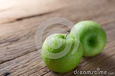 Fresh Green Apple on Wood Stock Photo